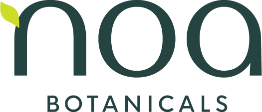 a black and green logo with the words botanicals on it.