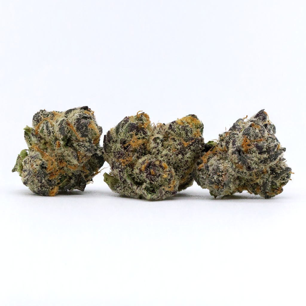 Three distinct cannabis strains arranged together.